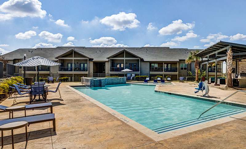 Gorgeous outdoor pool - Madison at Westinghouse Apartments in Georgetown, TX