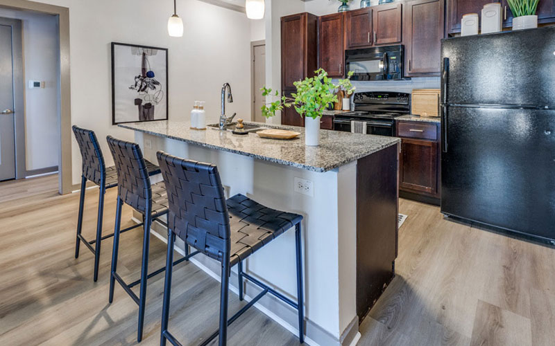 Well lit kitchen - Madison at Westinghouse Apartments in Georgetown, TX