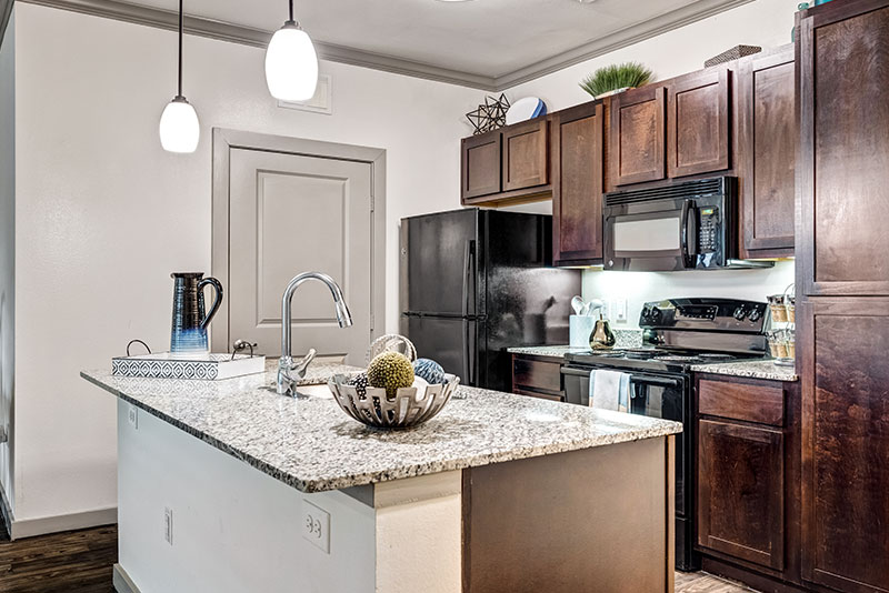 Well lit kitchen - Madison at Westinghouse Apartments in Georgetown, TX